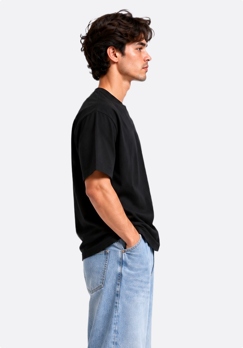 Men's black oversized cotton T-shirt – front three-quarter view